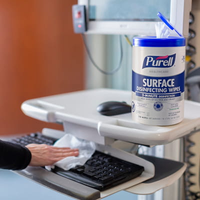 PURELL Healthcare Surface Disinfecting Wipes being used in healthcare setting to clean electronic screen