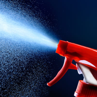 close-up of mist coming out of a disinfectant spray bottle